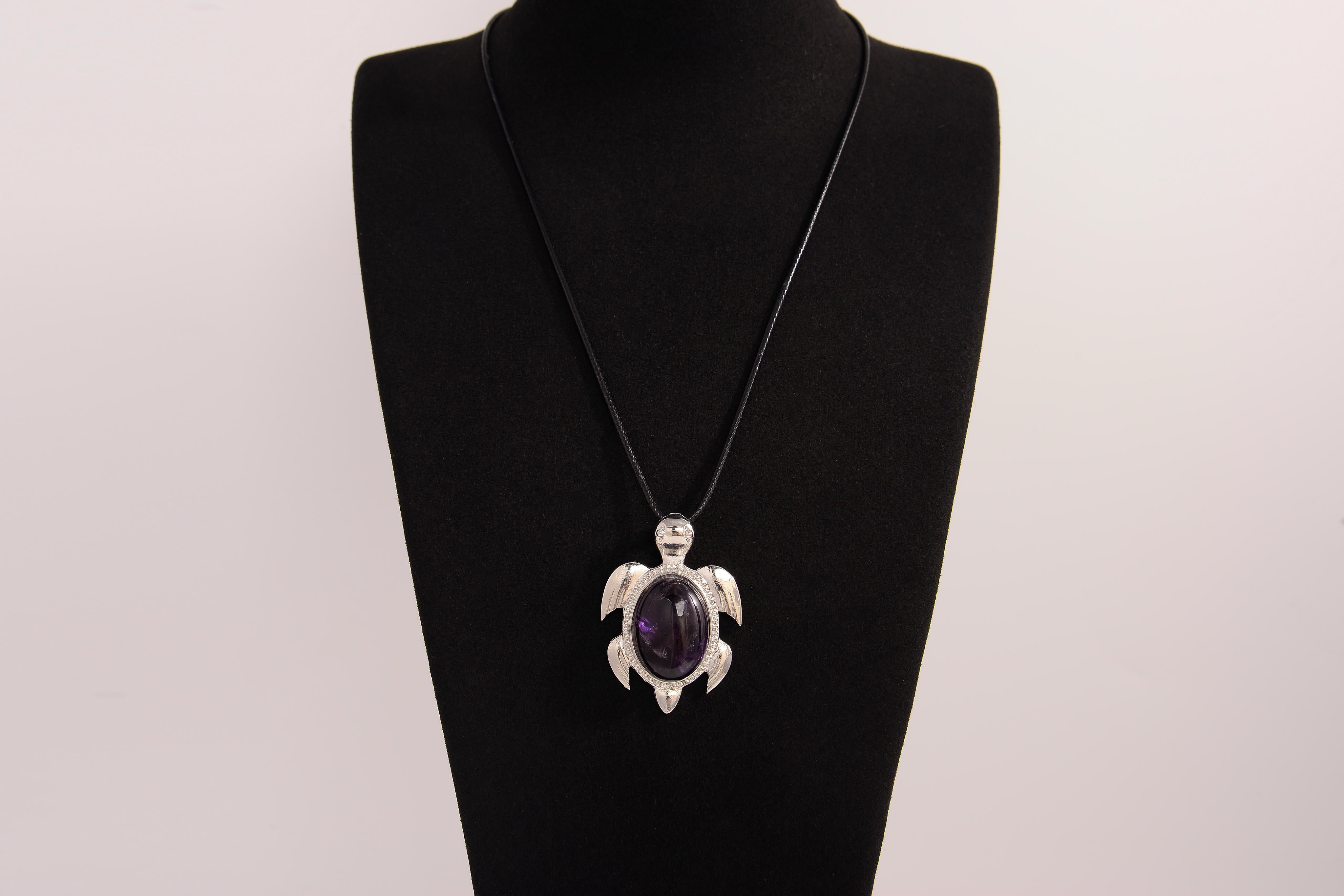 Raw Earth Crystals amethyst turtle necklace made from natural crystal to enhance spiritual awareness, calm the mind, and promote inner peace.