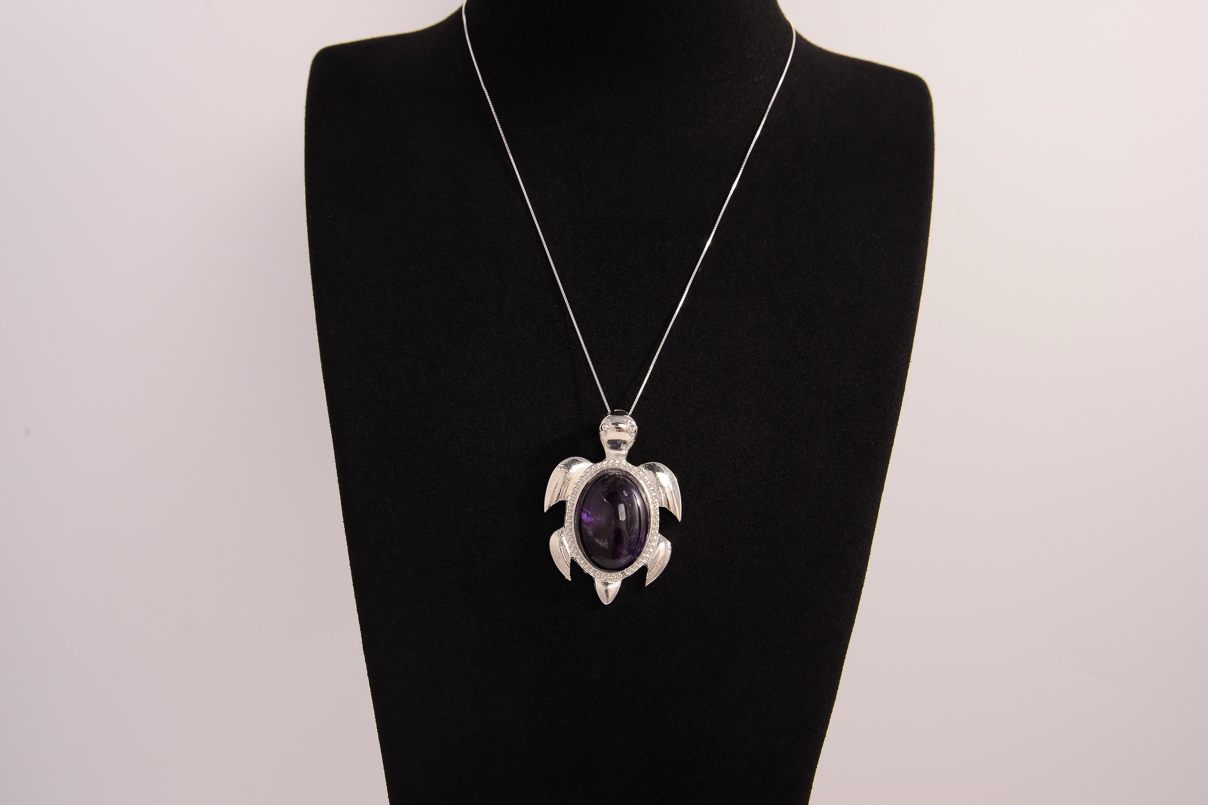 Raw Earth Crystals amethyst turtle necklace made from natural crystal to enhance spiritual awareness, calm the mind, and promote inner peace.