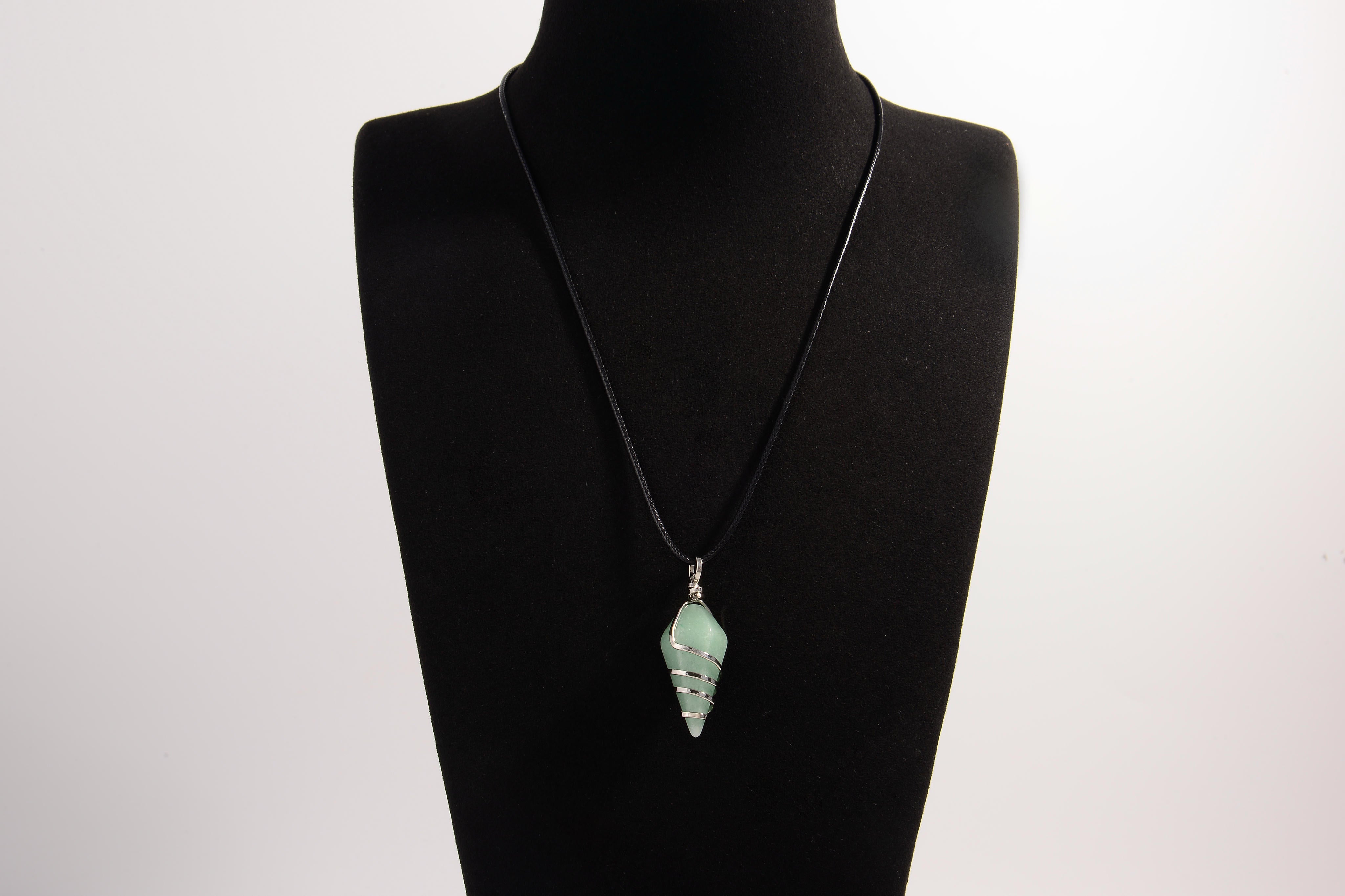 Raw Earth Crystals aventurine pendant with a spiral wire wrap design, crafted from natural stone to enhance luck, prosperity, and emotional balance.