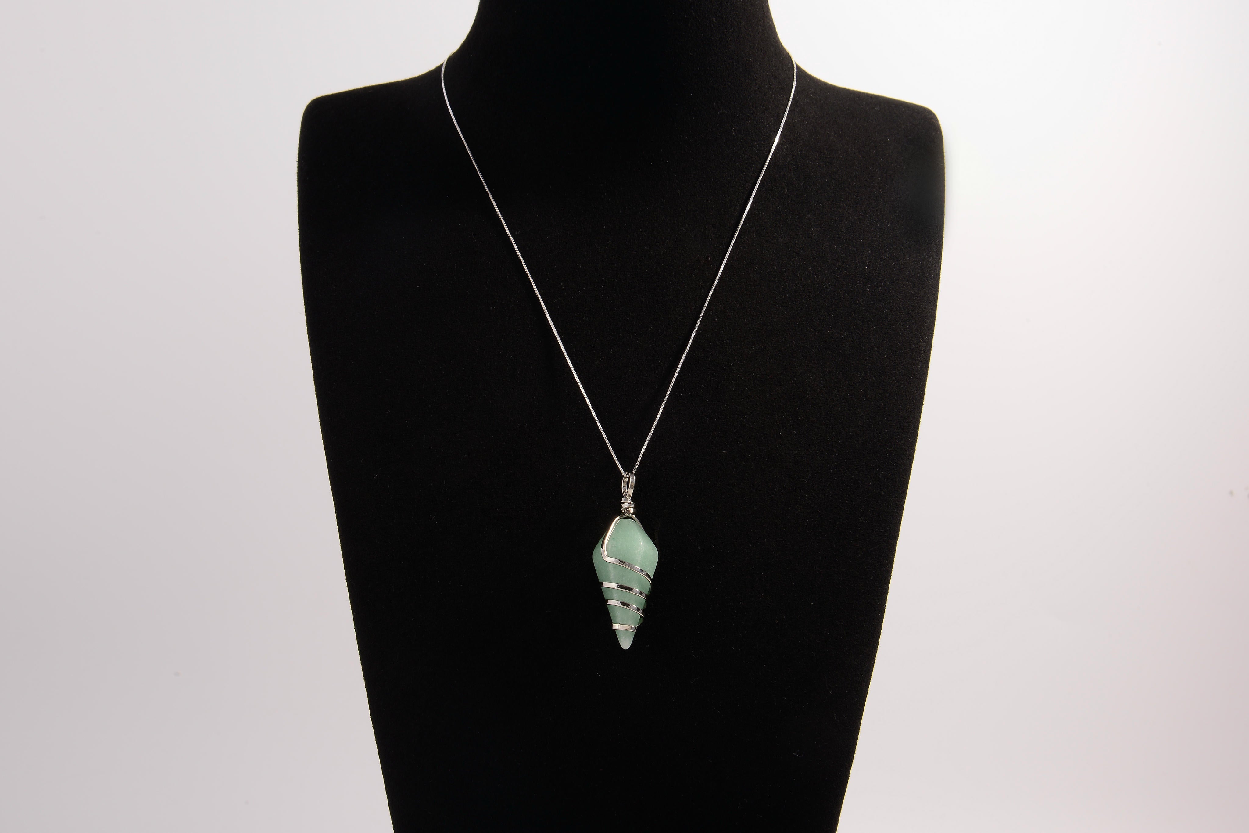Raw Earth Crystals aventurine pendant with a spiral wire wrap design, crafted from natural stone to enhance luck, prosperity, and emotional balance.