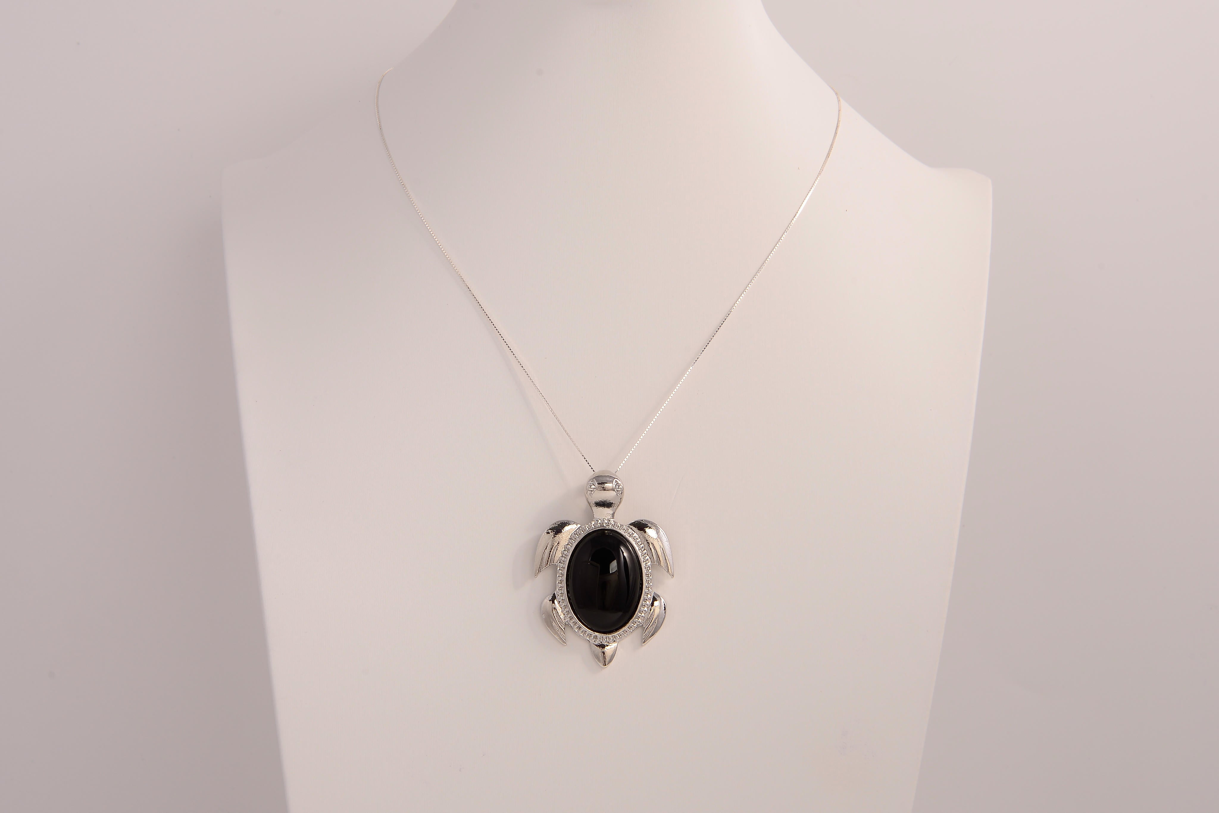 Raw Earth Crystals black obsidian turtle necklace made from natural crystal to offer grounding, protection, and emotional stability.