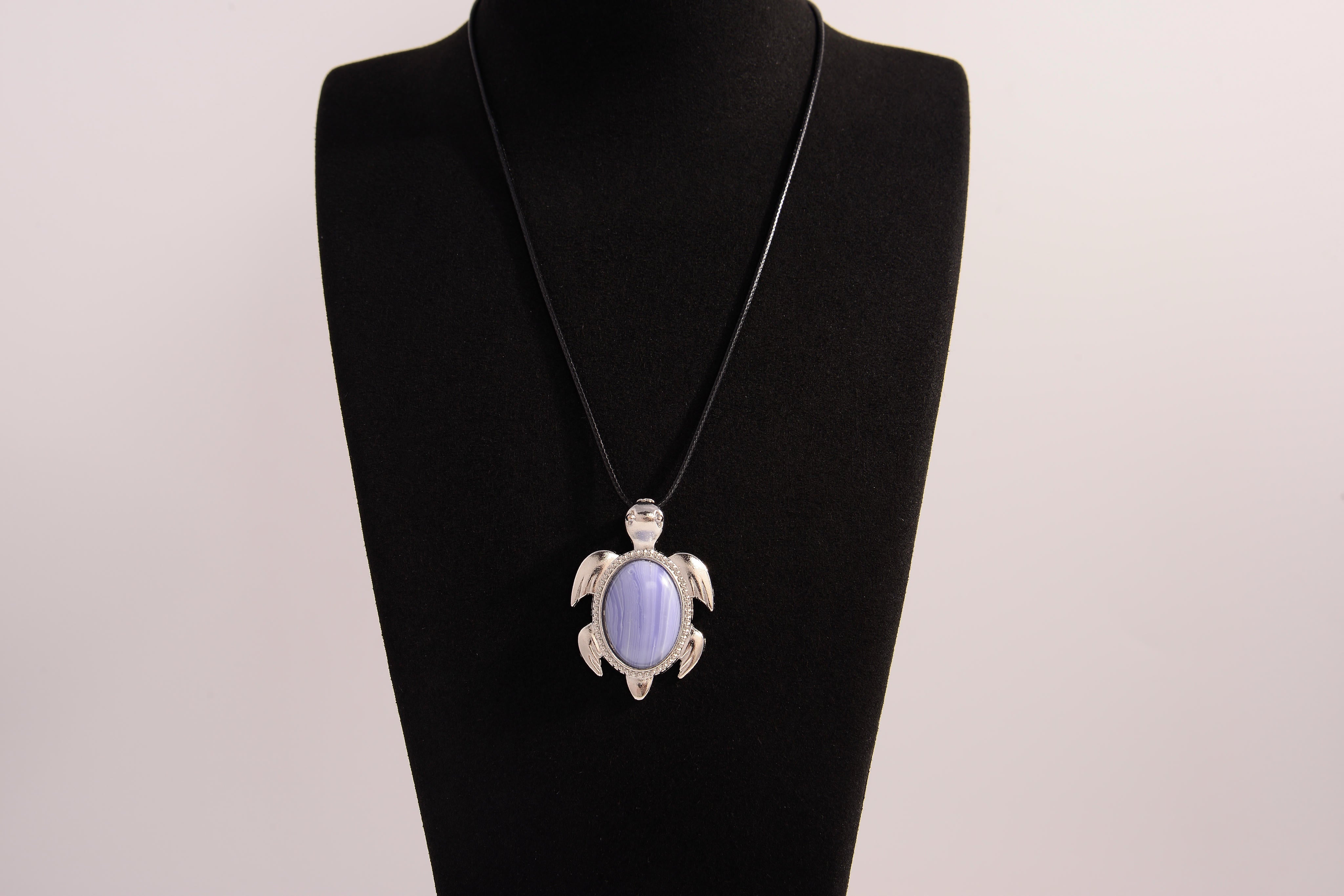 Raw Earth Crystals blue agate turtle necklace made from natural crystal to promote peace, emotional balance, and soothing energy.