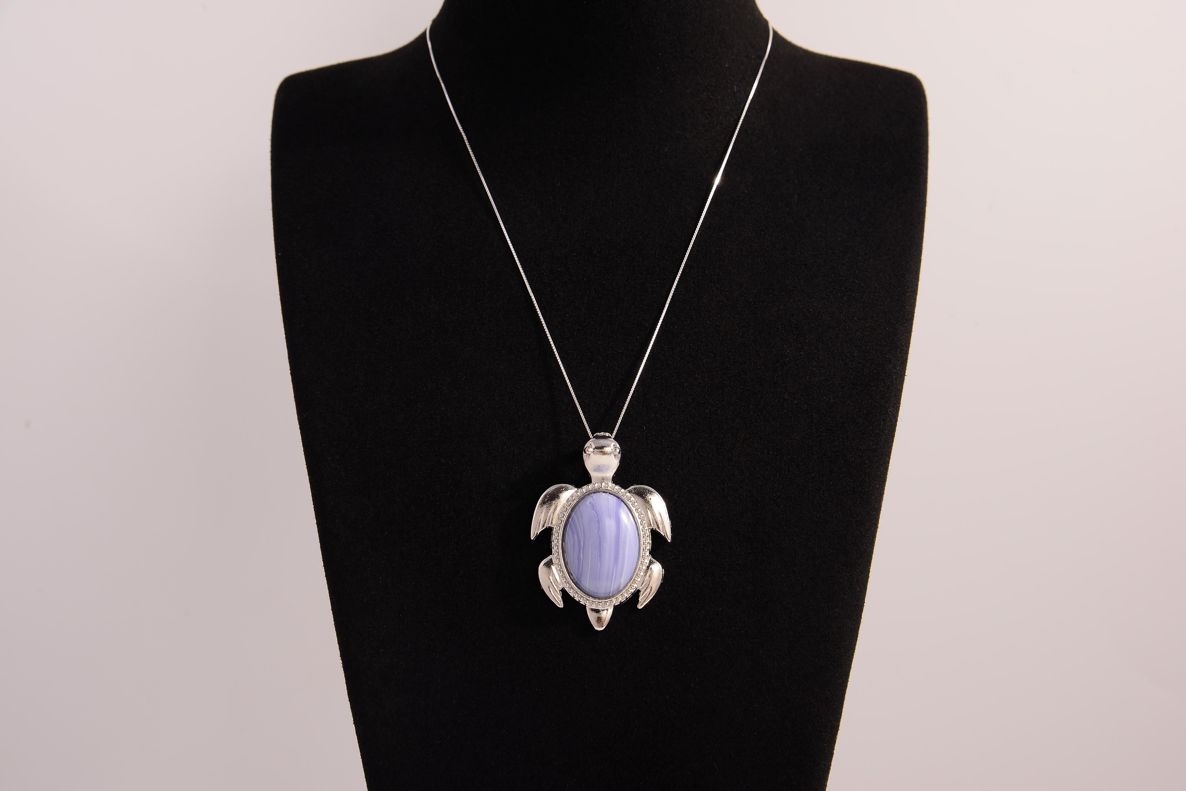Raw Earth Crystals blue agate turtle necklace made from natural crystal to promote peace, emotional balance, and soothing energy.