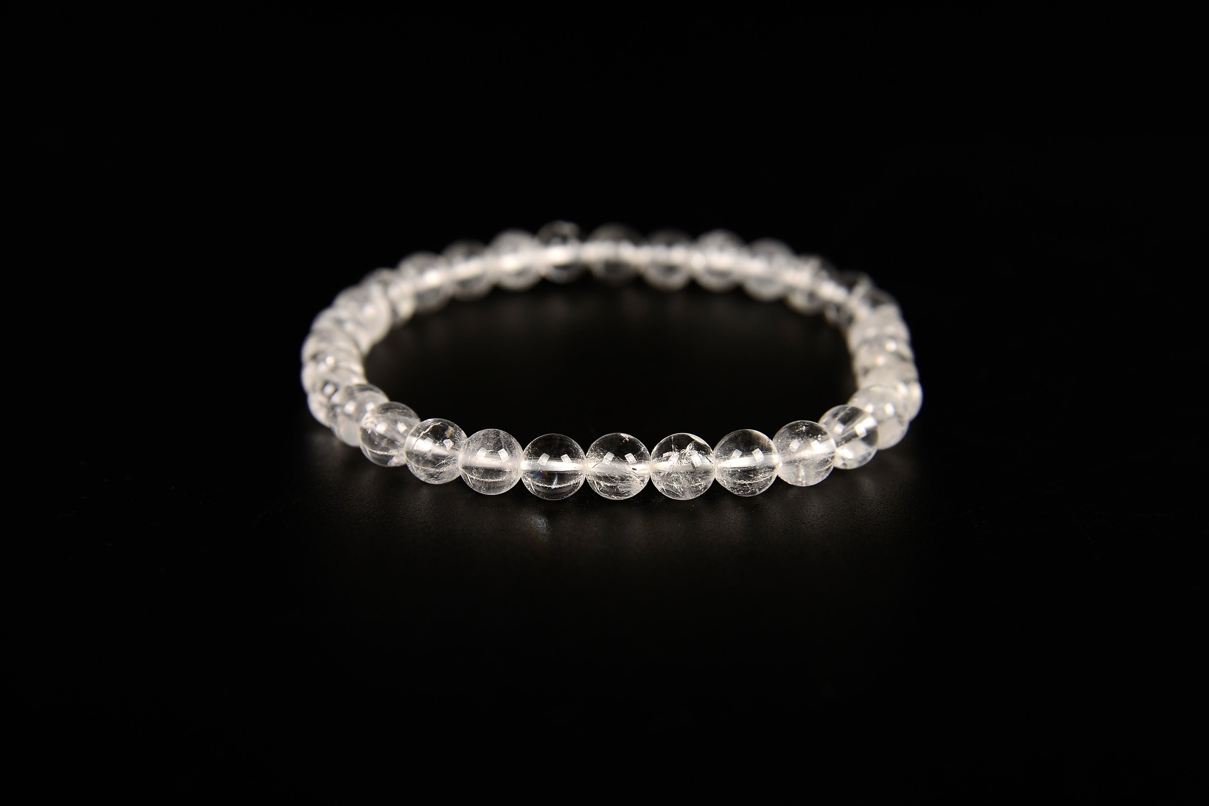 Clear quartz beaded bracelet from Raw Earth Crystals, featuring natural crystal beads for clarity, healing, and spiritual energy.