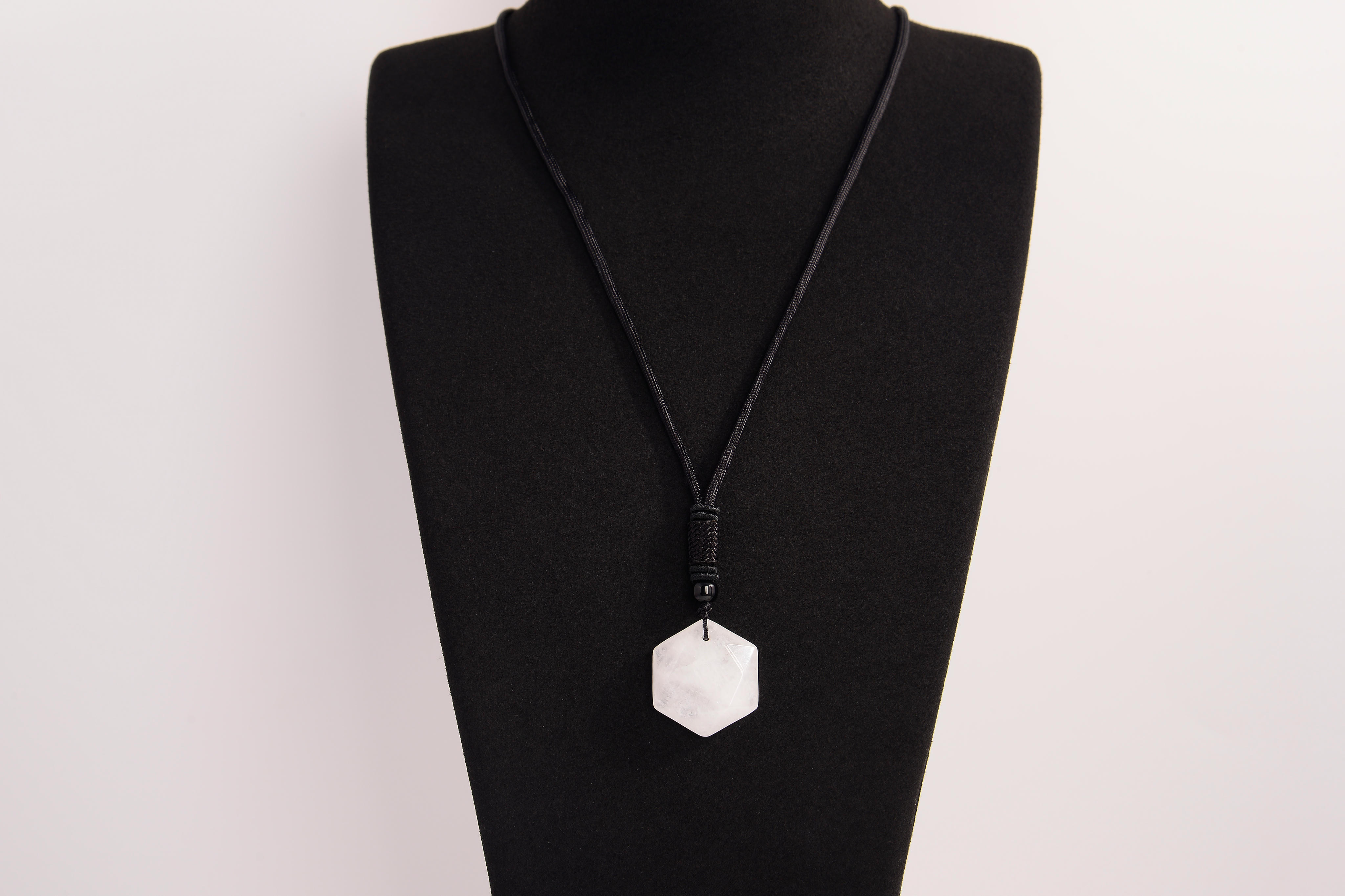 Raw Earth Crystals clear quartz geometric pendant necklace made with natural crystal for clarity, amplification, and spiritual alignment.