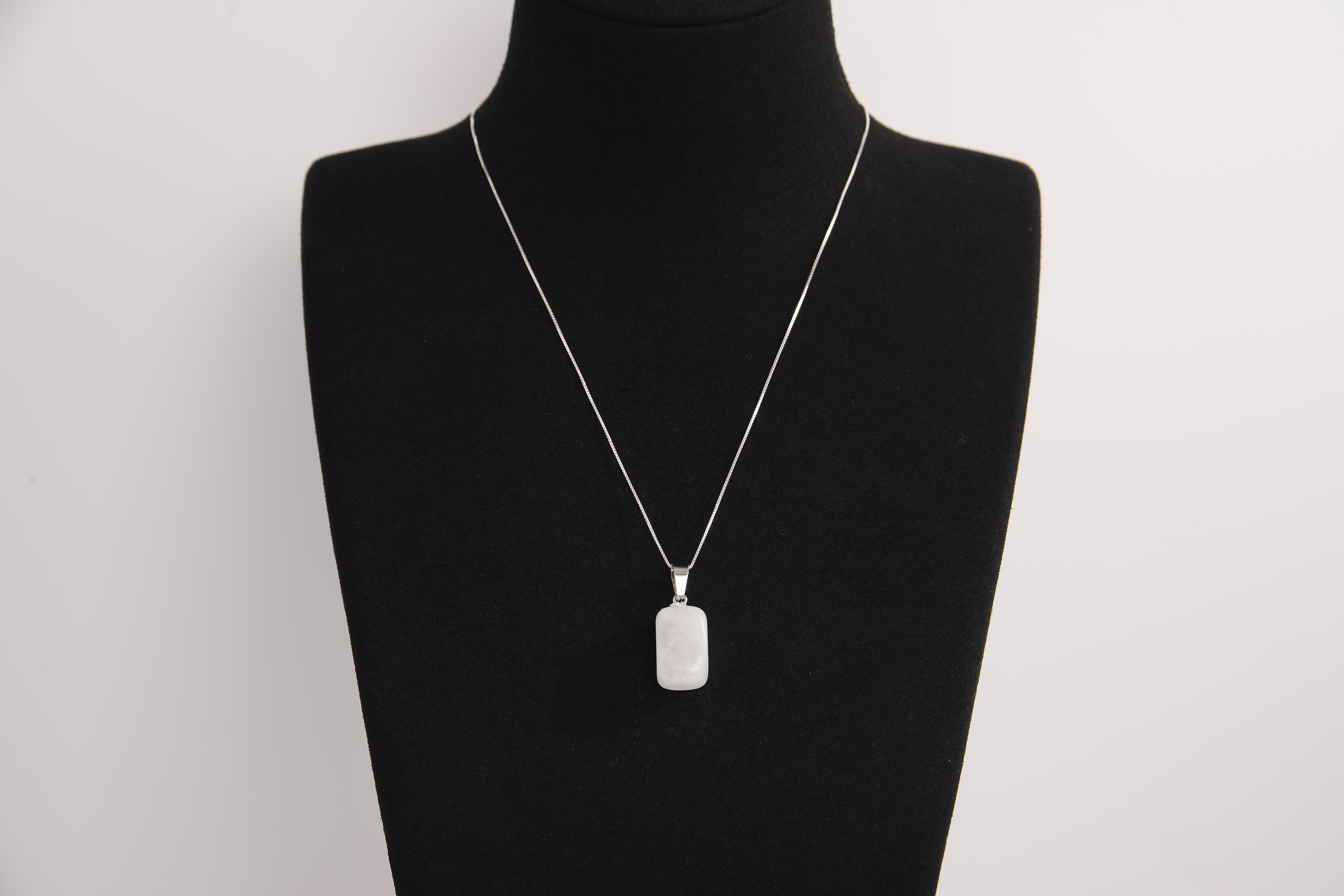 Raw Earth Crystals clear quartz rectangle pendant necklace, made from natural clear quartz to amplify energy, clarity, and spiritual focus.