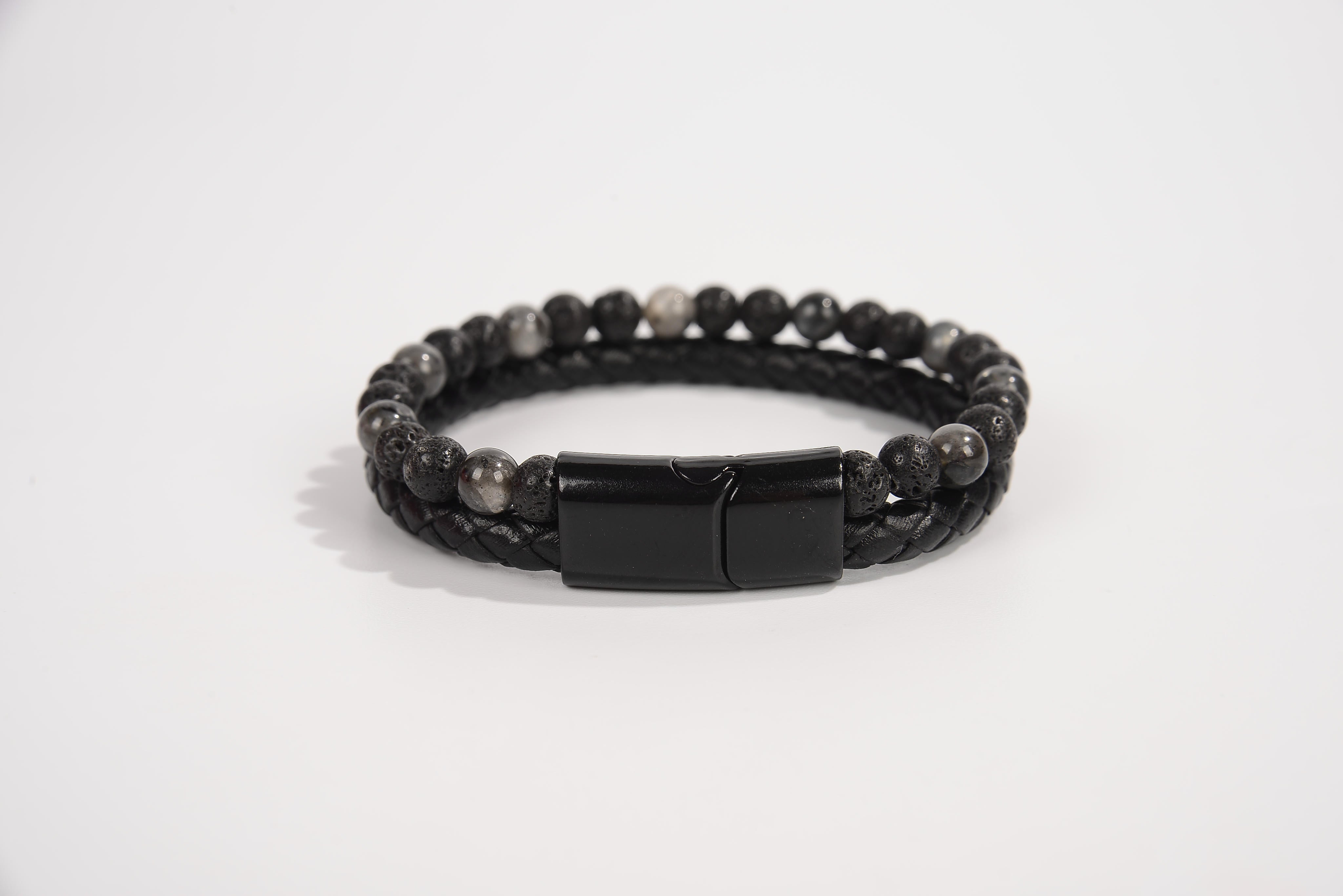 Raw Earth Crystals hematite bracelet with braided leather design, made from natural crystal, enhances focus, grounding, and energy balance.