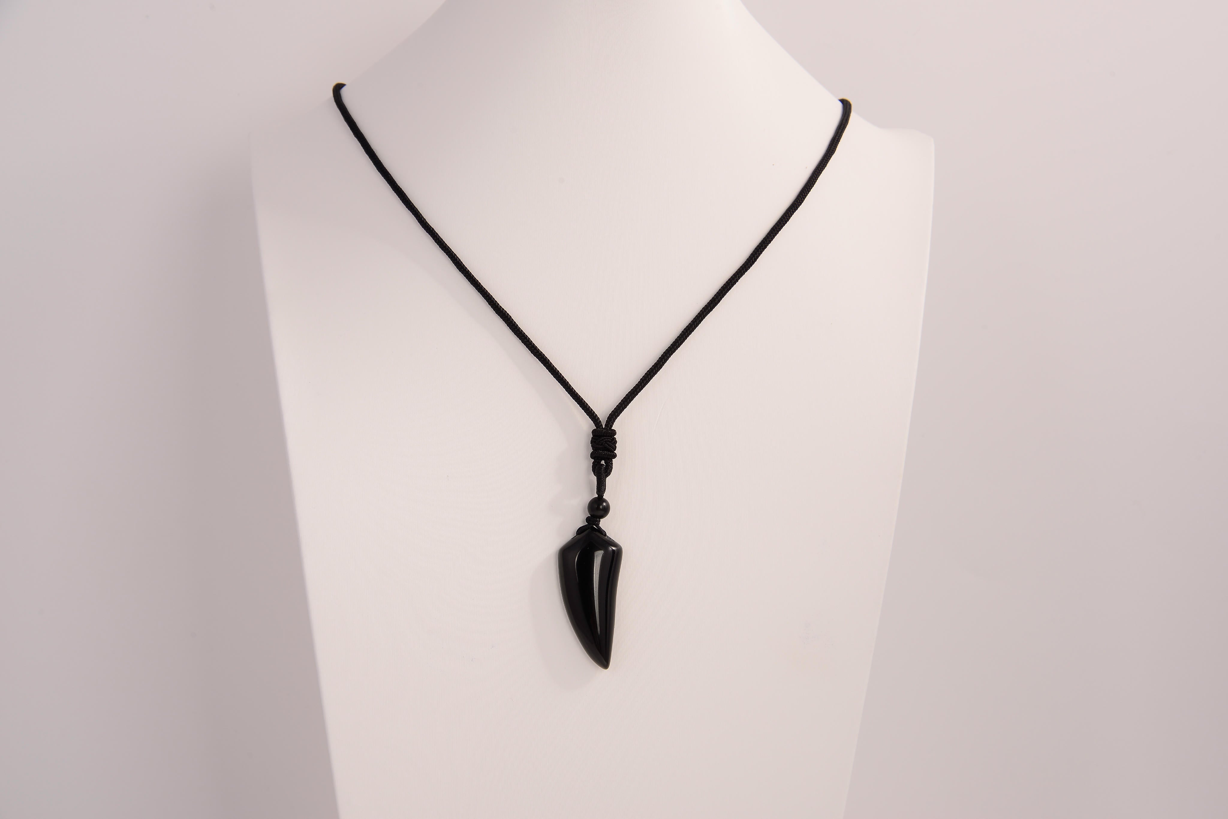 Raw Earth Crystals obsidian point pendant necklace featuring natural crystal jewelry designed for protection, grounding, and emotional healing.