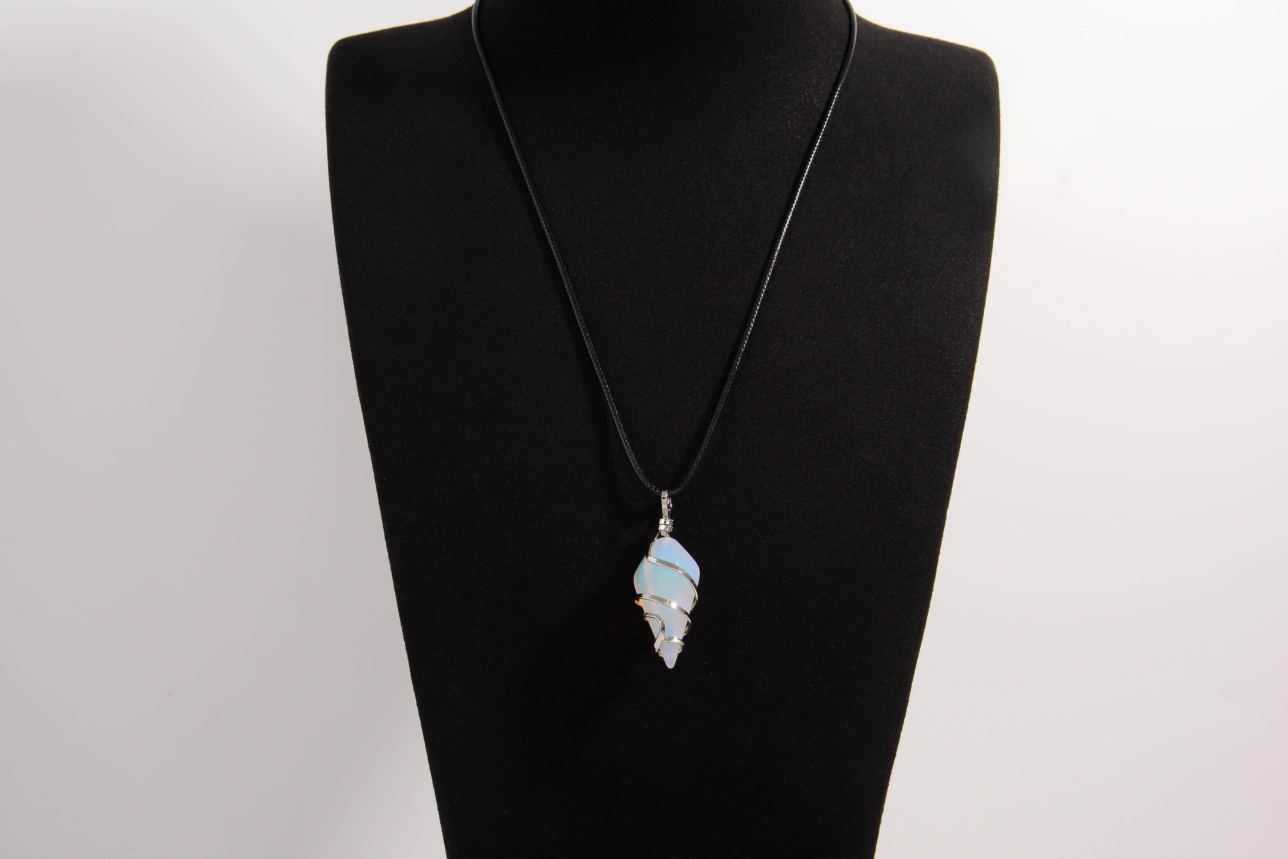 Raw Earth Crystals opalite pendant with a spiral wire wrap design, crafted from natural stone to promote emotional balance, calmness, and inner peace.