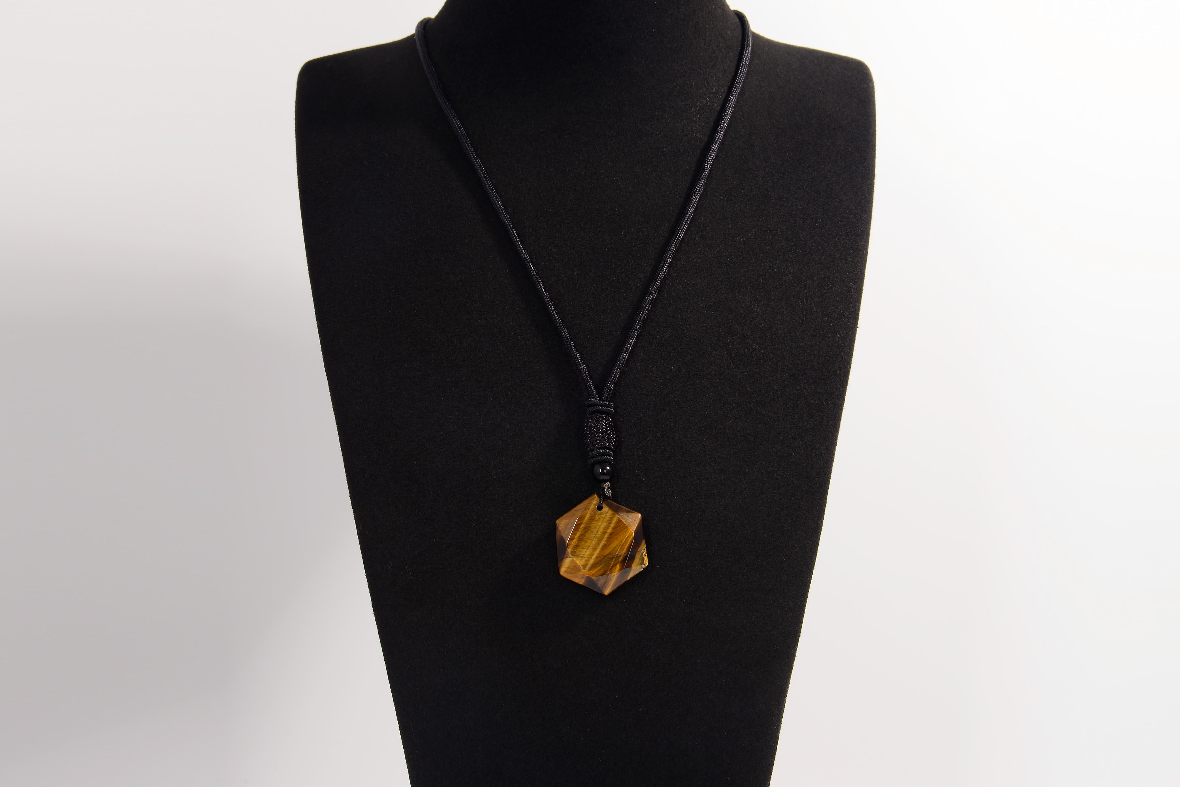 Raw Earth Crystals tiger eye geometric pendant necklace crafted from natural crystal for confidence, protection, and grounding energy.