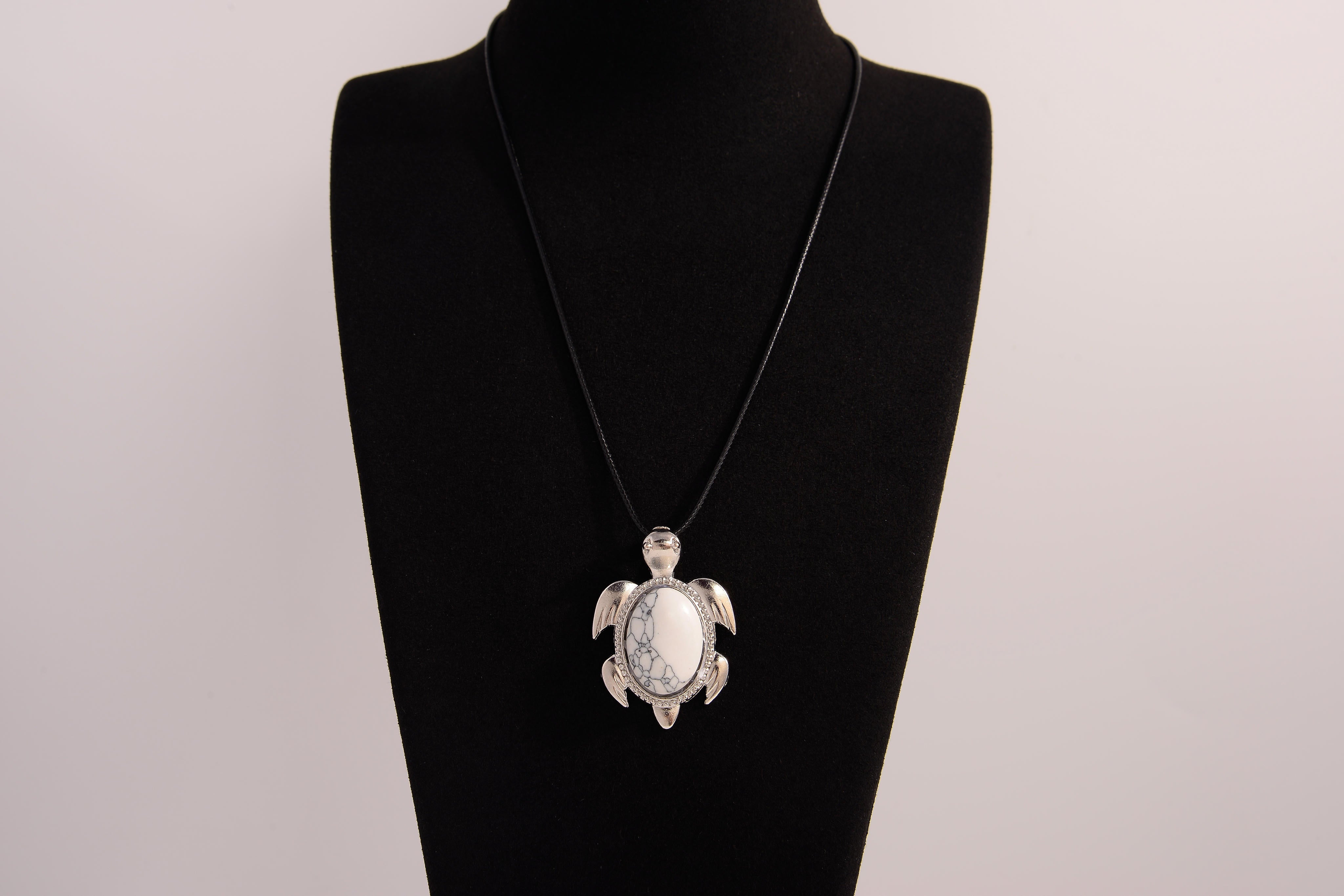 Raw Earth Crystals white turquoise turtle necklace crafted from natural stone to encourage calmness, clarity, and emotional healing.