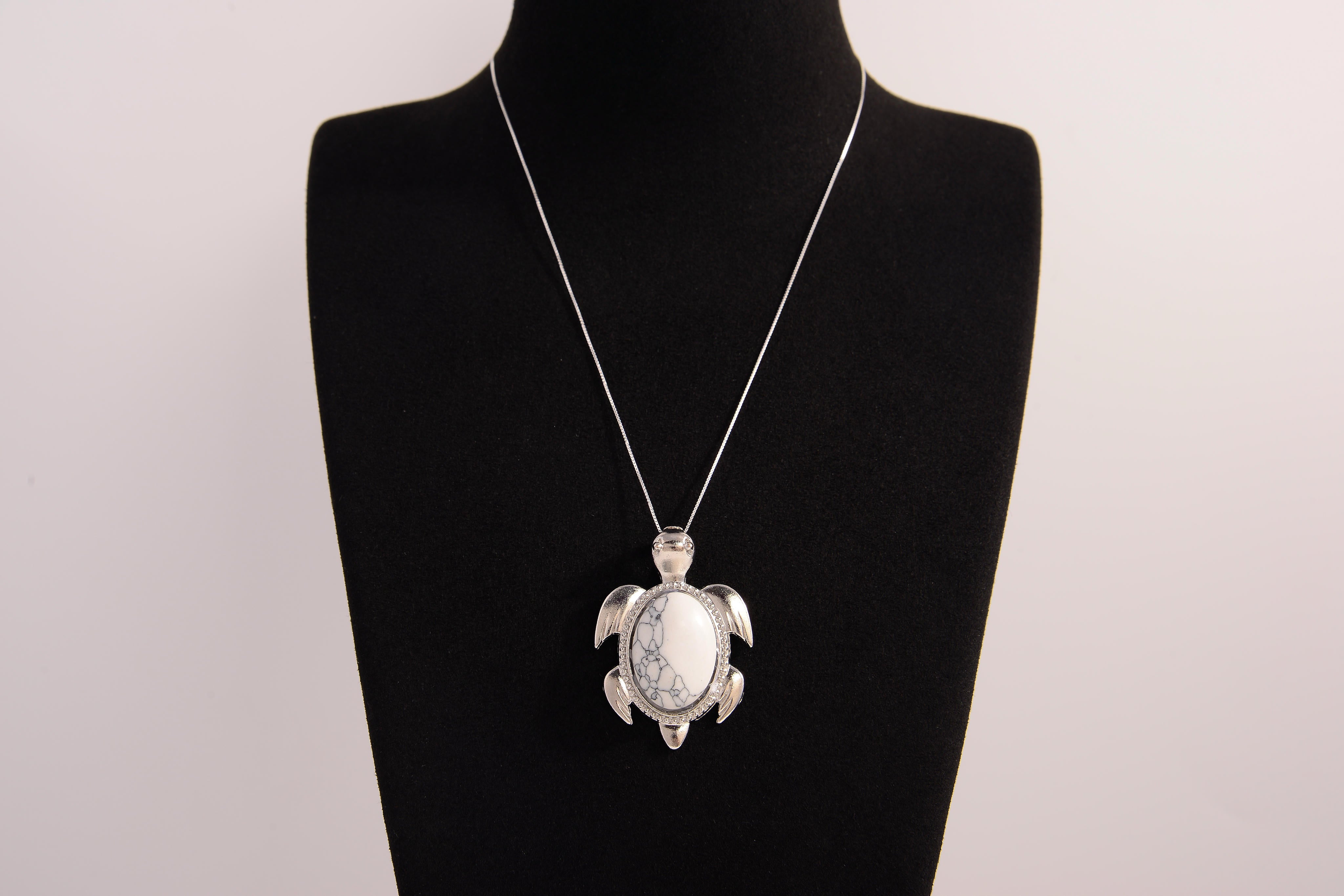 Raw Earth Crystals white turquoise turtle necklace crafted from natural stone to encourage calmness, clarity, and emotional healing.