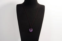 Raw Earth Crystals amethyst disc pendant necklace made with natural crystal for spiritual awareness, peace, and intuition.