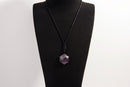 Raw Earth Crystals amethyst geometric pendant necklace made with natural crystal for spiritual growth, calmness, and enhanced intuition.