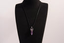 Raw Earth Crystals amethyst necklace with a pointed natural stone pendant, designed to enhance spiritual awareness, promote calmness, and support intuition.