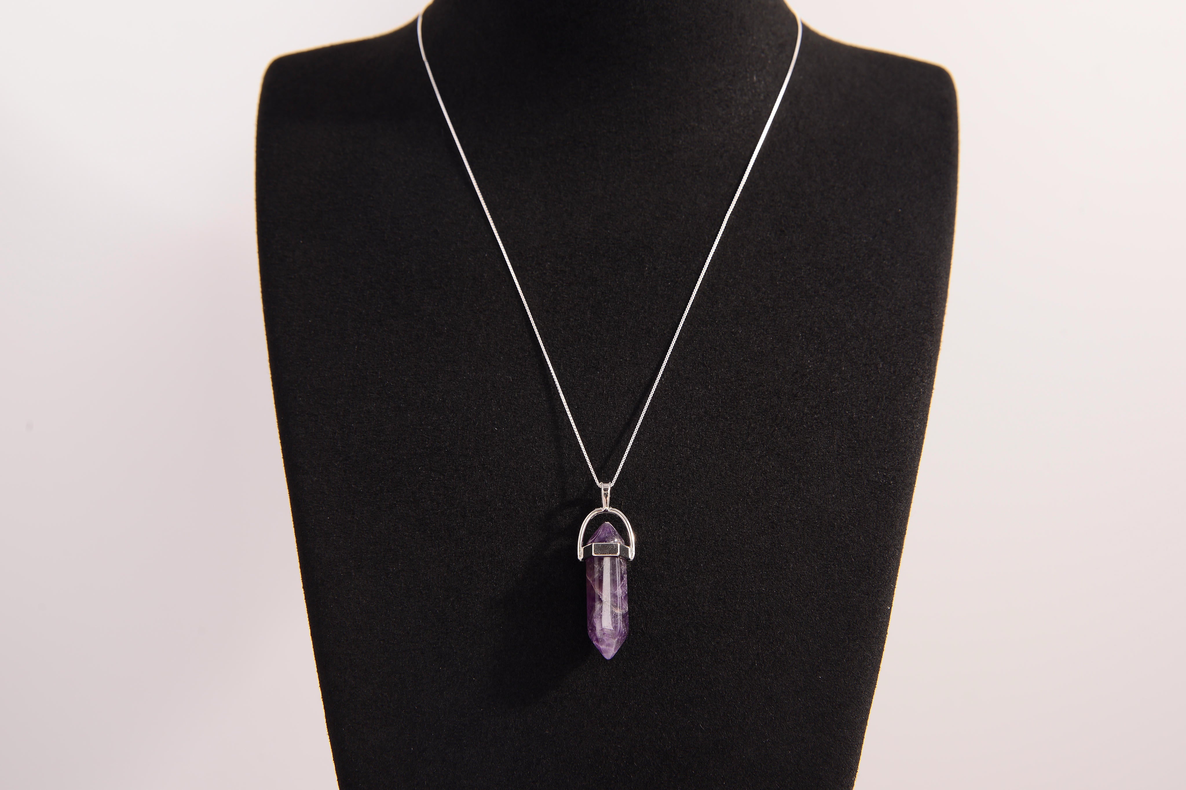 Raw Earth Crystals amethyst necklace with a pointed natural stone pendant, designed to enhance spiritual awareness, promote calmness, and support intuition.