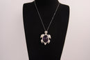 Raw Earth Crystals amethyst turtle necklace made from natural crystal to enhance spiritual awareness, calm the mind, and promote inner peace.