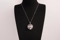 Raw Earth Crystals amethyst pendant featuring a tree of life design, crafted with natural crystal for spiritual awareness, calmness, and protection.