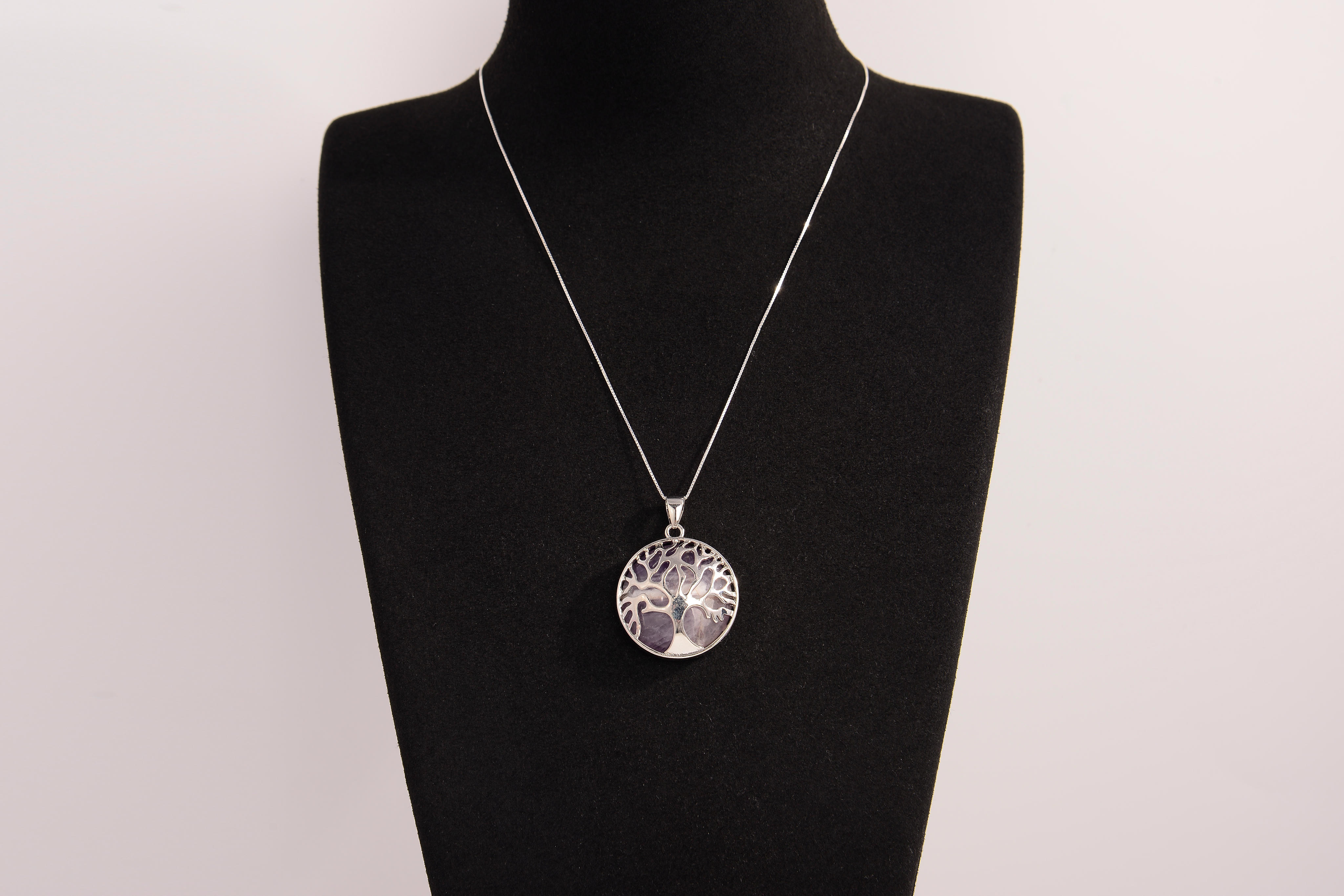 Raw Earth Crystals amethyst pendant featuring a tree of life design, crafted with natural crystal for spiritual awareness, calmness, and protection.