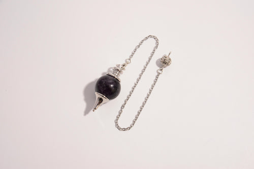 Raw Earth Crystals amethyst pendulum with silver chain, crafted from natural amethyst and sterling silver, promoting intuition, balance, and spiritual clarity.