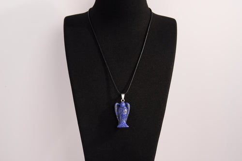 Raw Earth Crystals angel pendant crafted from carved lapis lazuli, featuring a deep blue hue with golden flecks to promote wisdom, intuition, and spiritual insight.