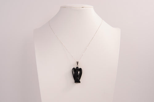 Raw Earth Crystals angel pendant crafted from carved obsidian, featuring a sleek, polished design to promote protection, grounding, and spiritual clarity.