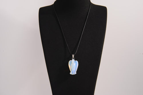 Raw Earth Crystals angel pendant crafted from carved opalite, featuring a soft, milky blue iridescence to promote calmness, emotional healing, and spiritual clarity.