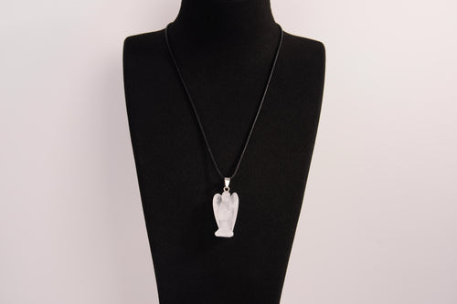 Raw Earth Crystals angel pendant crafted from clear quartz, featuring a delicate sculpted design to promote clarity, spiritual connection, and energetic purification.
