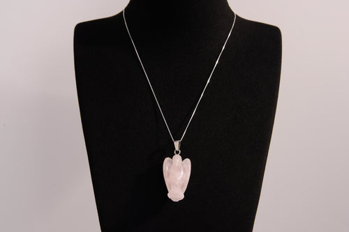 Raw Earth Crystals angel pendant crafted from rose quartz, featuring a delicate sculpted design to promote love, compassion, and emotional healing.