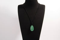 Raw Earth Crystals aventurine teardrop pendant on black cord, made from natural aventurine stone, promoting luck, prosperity, and emotional balance.
