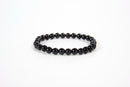Black obsidian beaded bracelet from Raw Earth Crystals, featuring natural gemstones for protection, grounding, and spiritual clarity.