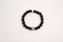 Raw Earth Crystals black onyx faceted bracelet with silver accent, crafted from natural crystal, promotes strength, protection, and emotional balance.