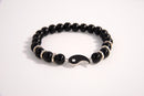 Raw Earth Crystals black tourmaline bracelet with yin yang design, made from natural crystal, supports balance, protection, and spiritual harmony.