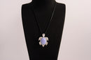 Raw Earth Crystals blue agate turtle necklace made from natural crystal to promote peace, emotional balance, and soothing energy.