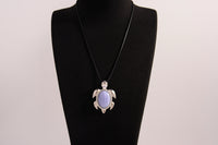 Raw Earth Crystals blue agate turtle necklace made from natural crystal to promote peace, emotional balance, and soothing energy.