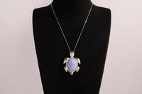 Raw Earth Crystals blue agate turtle necklace made from natural crystal to promote peace, emotional balance, and soothing energy.