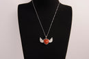 Raw Earth Crystals carnelian heart with wings necklace, featuring a vibrant orange-red heart-shaped stone adorned with delicate angelic wings, designed to boost energy, enhance motivation, and support emotional strength.