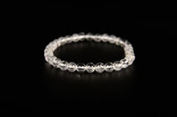 Clear quartz beaded bracelet from Raw Earth Crystals, featuring natural crystal beads for clarity, healing, and spiritual energy.