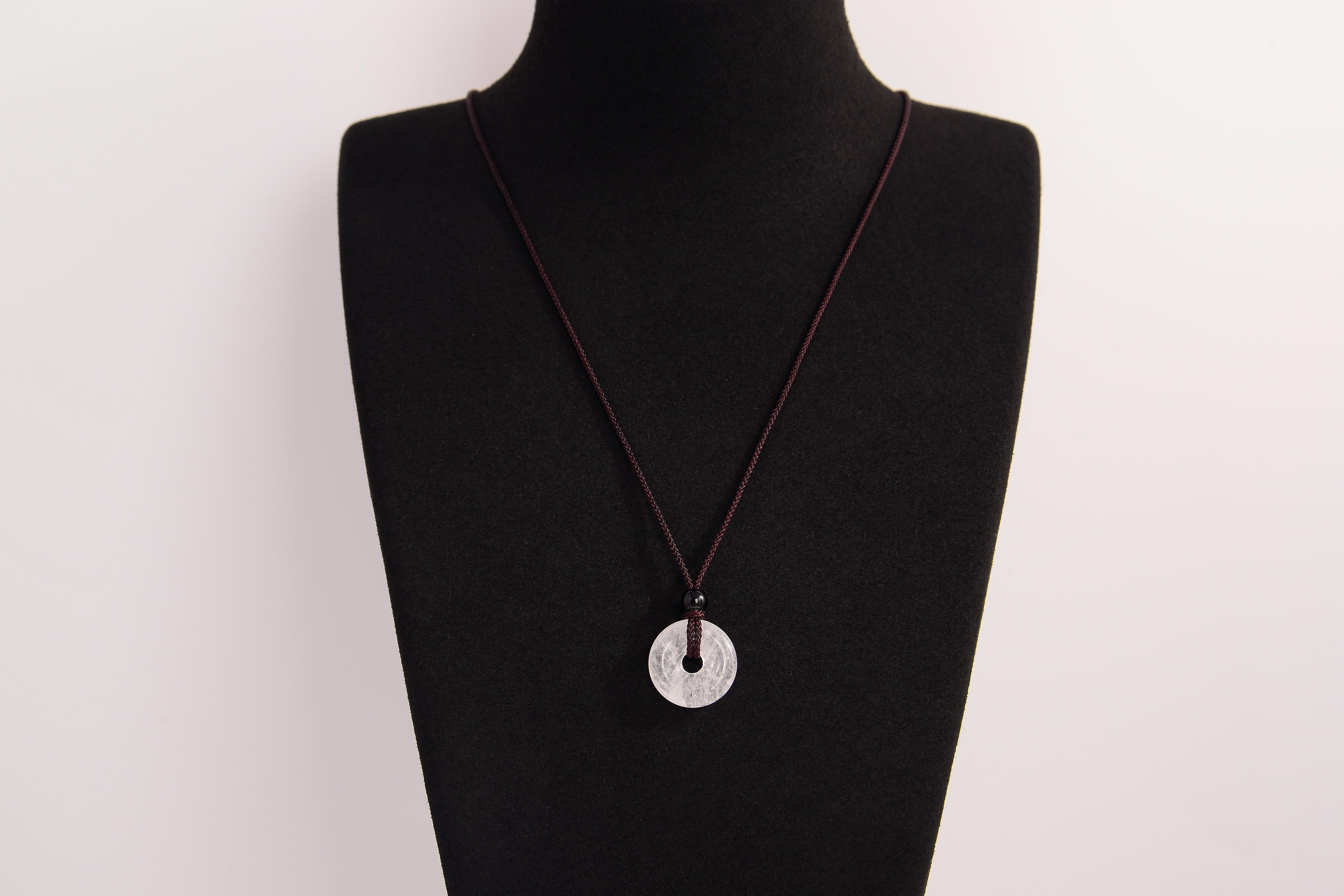 Raw Earth Crystals clear quartz disc pendant necklace featuring a natural crystal for balance, clarity, and spiritual protection.