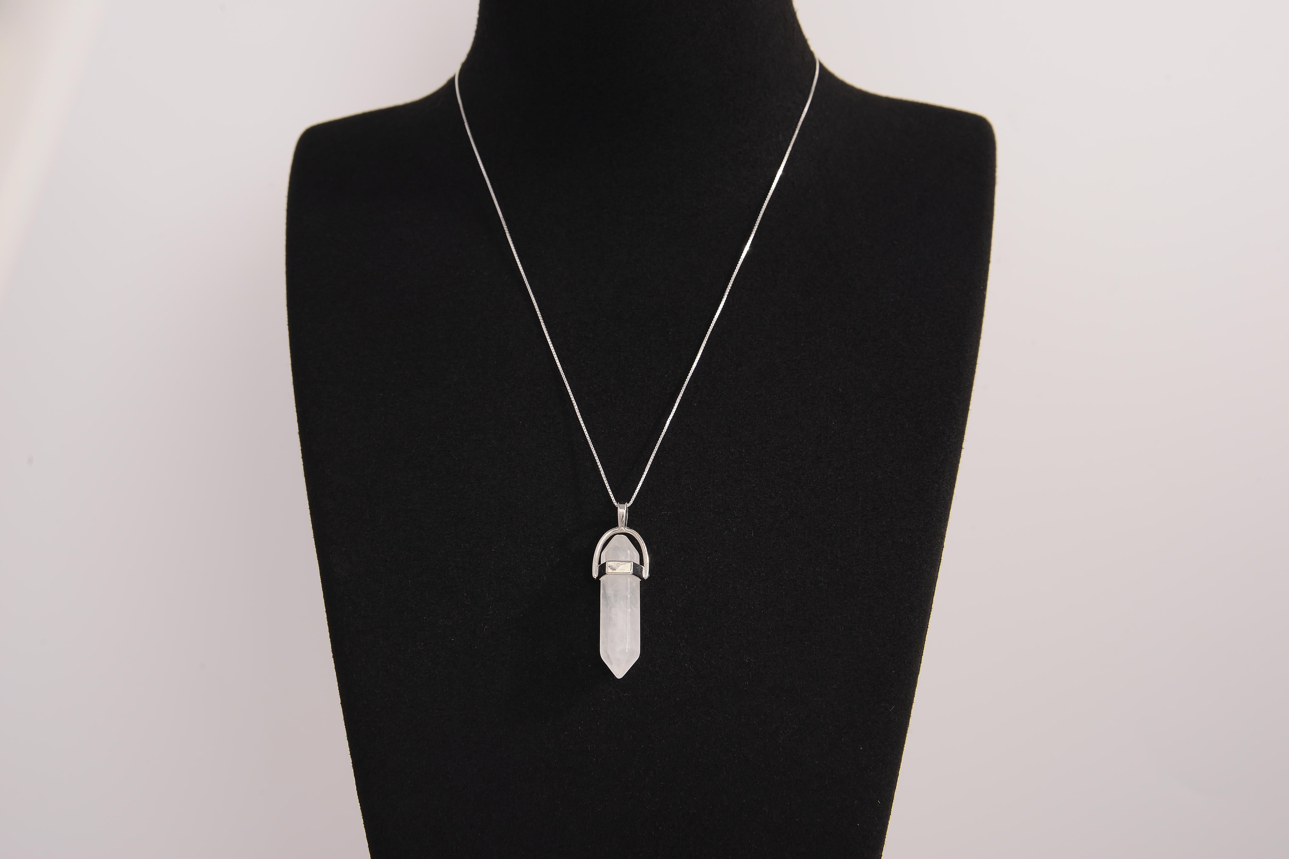 Raw Earth Crystals clear quartz necklace with a pointed natural stone pendant, designed to enhance clarity, amplify energy, and support spiritual awareness.