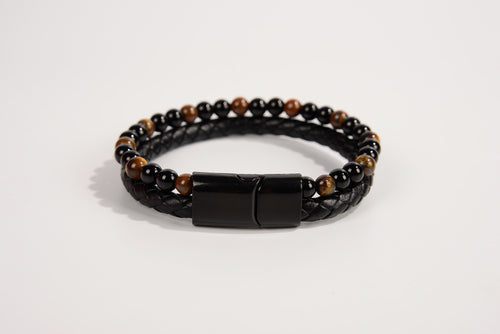 Raw Earth Crystals garnet and onyx bracelet with braided leather design, crafted from natural crystals, supports strength, protection, and emotional healing.