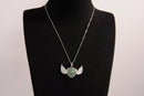 Raw Earth Crystals green aventurine heart with wings necklace, featuring a vibrant green heart-shaped stone adorned with delicate angelic wings, designed to promote abundance, emotional balance, and spiritual growth.
