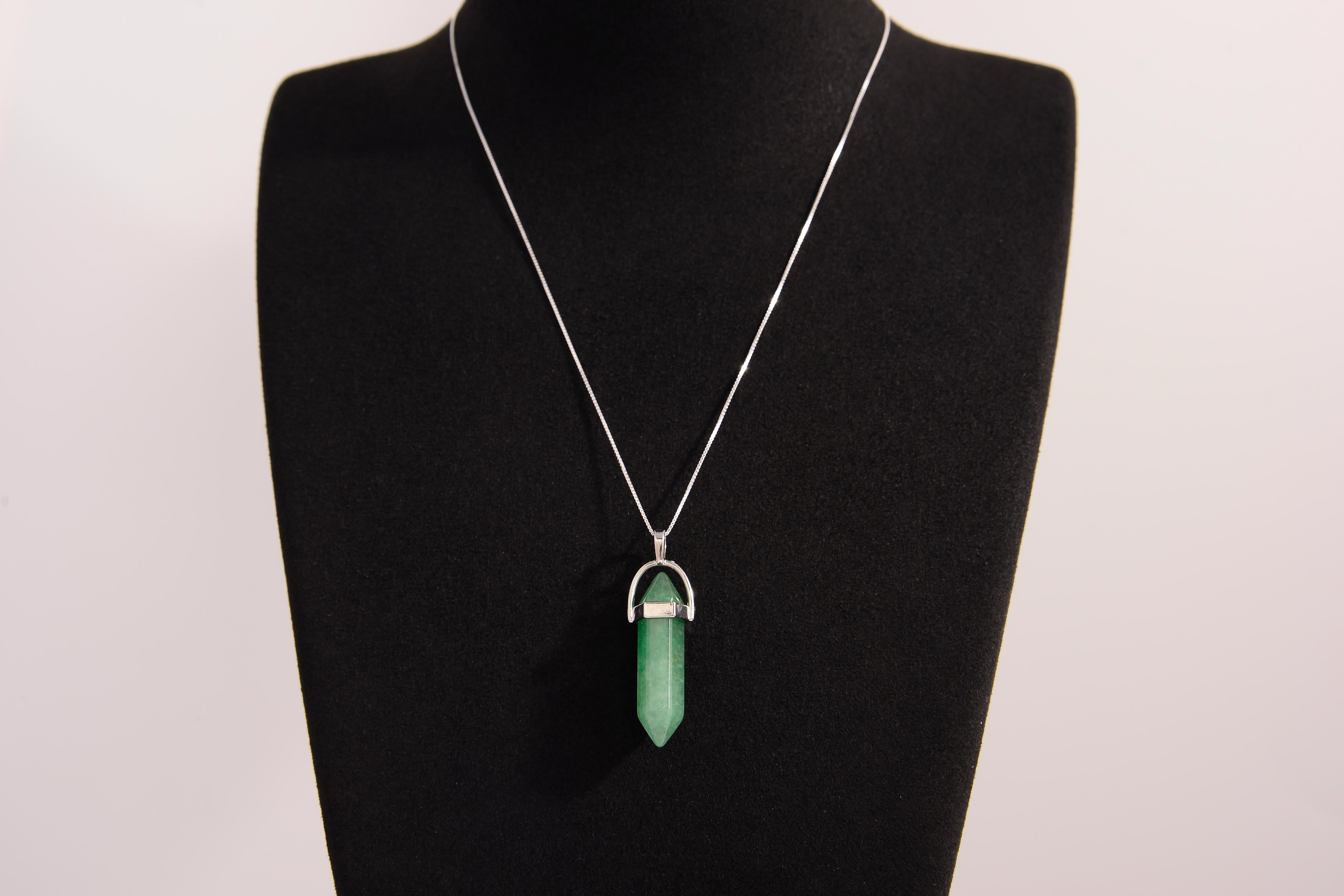 Raw Earth Crystals green aventurine necklace with a pointed natural stone pendant, designed to promote emotional balance, enhance luck, and support personal growth.