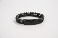 Raw Earth Crystals hematite bracelet with braided leather design, made from natural crystal, enhances focus, grounding, and energy balance.