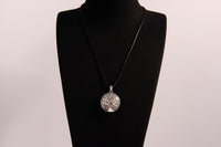 Raw Earth Crystals labradorite pendant featuring a tree of life design, crafted with natural crystal for protection, intuition, and inner strength.
