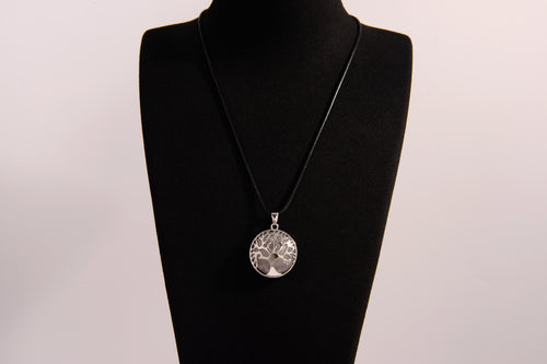 Raw Earth Crystals labradorite pendant featuring a tree of life design, crafted with natural crystal for protection, intuition, and inner strength.