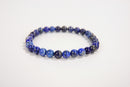 Lapis lazuli beaded bracelet from Raw Earth Crystals, featuring natural gemstones for wisdom, truth, and throat chakra balance.