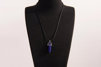 Raw Earth Crystals lapis lazuli necklace featuring a pointed natural stone pendant, designed to enhance wisdom, support self-expression, and promote inner truth.
