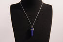 Raw Earth Crystals lapis lazuli necklace featuring a pointed natural stone pendant, designed to enhance wisdom, support self-expression, and promote inner truth.