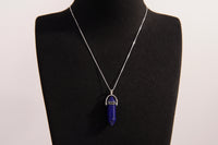 Raw Earth Crystals lapis lazuli necklace featuring a pointed natural stone pendant, designed to enhance wisdom, support self-expression, and promote inner truth.